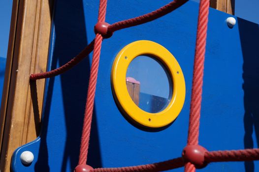 Window at the playground stylized under the ship