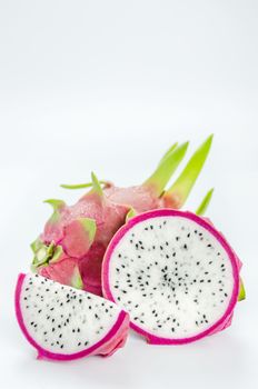 Ripe Dragon fruit or Pitaya with slice on white background