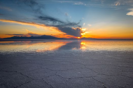 Sunset in Salar de Uyuni salt flats desert, Andes Altiplano, Bolivia