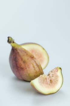 sliced fresh figs fruit on white background