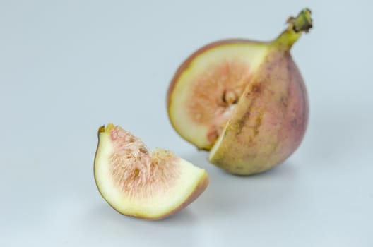sliced fresh figs fruit on white background