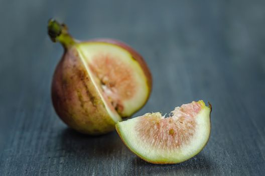 Portion of fresh Figs on wooden background