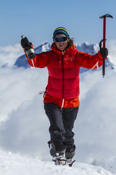 A women fririder on a mountain top
