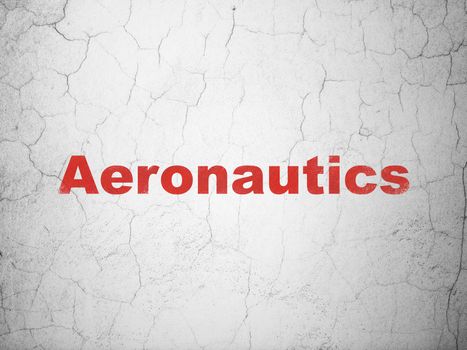 Science concept: Red Aeronautics on textured concrete wall background
