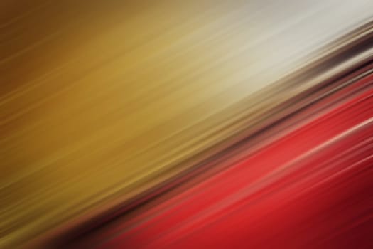 abstract slanting red gold blurred background
