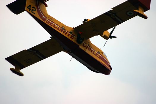 Menton, France - September 9, 2015: Canadair CL-415 (Securite Civile) Airplane Extinguish Forest in Flame in Menton, French Riviera