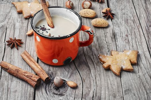 Homemade Christmas cookies with spices, and coffee with milk