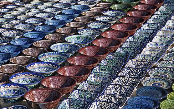 Traditional ceramic dishware in a street market, Uzbekistan