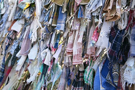 Close up of lots of Buddhist ribbons fluttering in the wind
