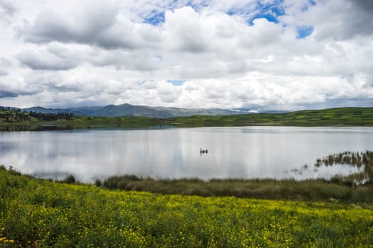 fishing in a lake in the mountain region near Cuzco,Peru