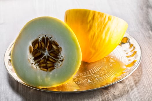 Cross Section of a honeydew melon on a table