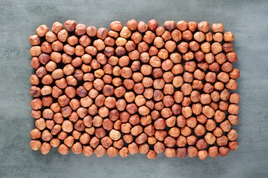 Background texture of Peeled hazelnuts macro closeup