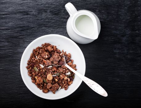 Healthy Chocolate Oat Bars Granola with milk on the table