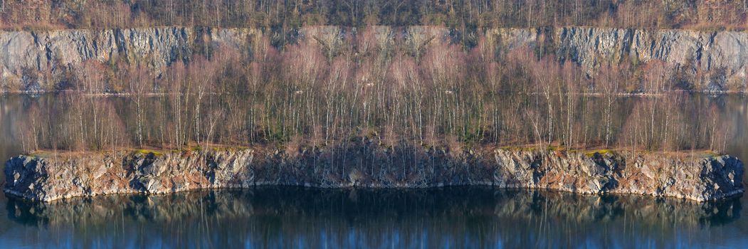 Panoramic view of an old open opencast mine of limestone works in Wuelfrath, Germany on a winter day.