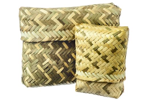 a basket  in a natural fibers woven on white background