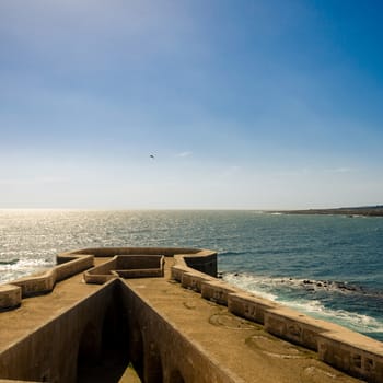 Scenic view of Maniace castle on sea, Syracuse, Sicily, Italy