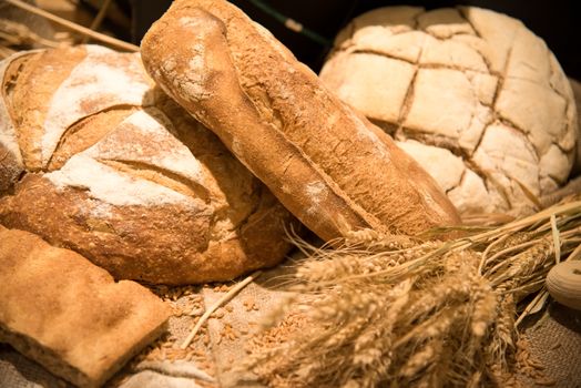 Loaves composition of Bread bakery background.