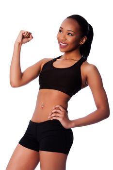 Beautiful healthy fit happy smiling celebrating black asian woman workout fitness and toned body.