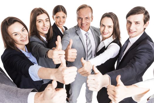 Business team showing thumb up isolated on white background