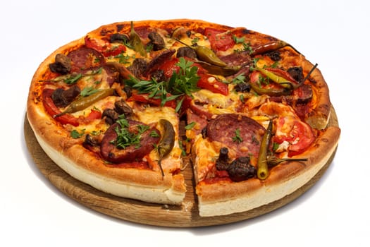 Fresh sliced pizza with sausage, mushrooms and hot pepper. Close-up