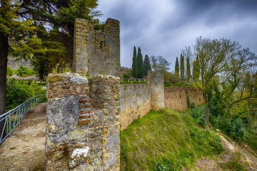 The big strong wall of the castle at Tomar, Portugal.