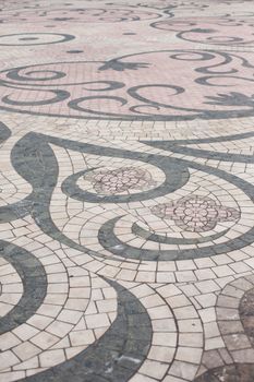 Colorful ornamental tiles floor in old style