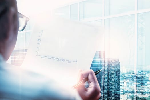 Business woman holding a paper with future planning.