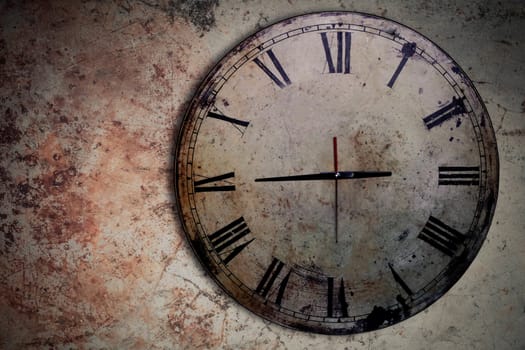 Antique clock on the old concrete floor.