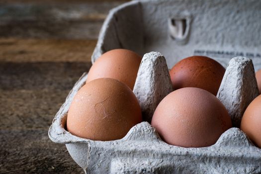 eggs canisters on an old wooden table