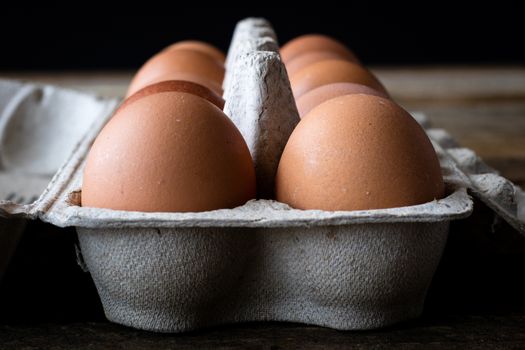 eggs canisters on an old wooden table