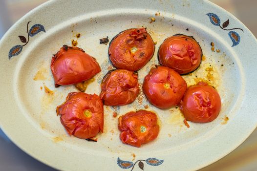 grilled tomato halves cut in the plate