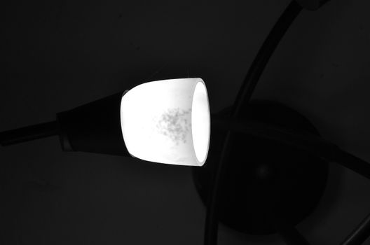 Light bulb into a dark room