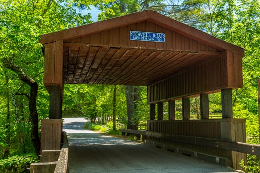 Stowell Road Covered Bridge, built in 1990, is located in Merrimack, NH. This little known bridge is one of the few located in the Merrimack Valley Region. The bridge spans Baboosic Brook.