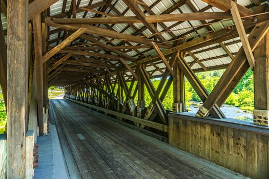 Rowell Covered Bridge is a covered bridge in Hopkinton, New Hampshire which carries Rowell Bridge Road over the Contoocook River. It is a long truss style bridge.