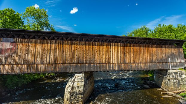 The Contoocook Railroad Bridge is a covered bridge on the former Contoocook Valley (first Concord & Claremont, later Boston & Maine) Railroad line spanning the Contoocook River in the center of the village of Contoocook, New Hampshire.