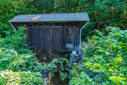 The Prentiss Bridge is the smallest bridge in New Hampshire at a length of only 36 feet. Spanning the Great Brook on the Old Cheshire Turnpike near the town of Langdon, New Hampshire, it was built in 1791 at a cost of 6 pounds.