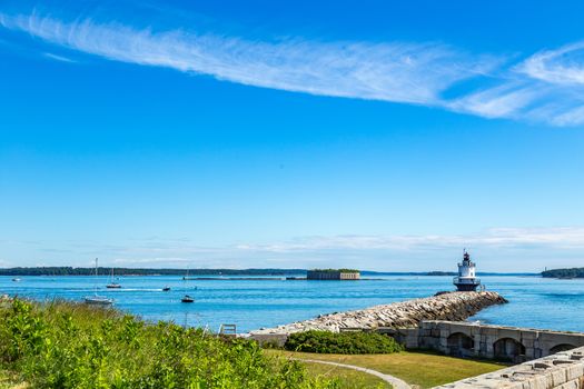 Spring Point Ledge Light is a sparkplug lighthouse in South Portland, Maine that marks a dangerous obstruction on the west side of the main shipping channel into Portland Harbor. It is now adjacent to the campus of Southern Maine Community College.