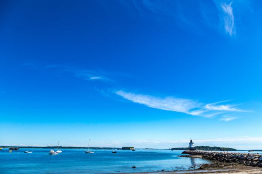 Spring Point Ledge Light is a sparkplug lighthouse in South Portland, Maine that marks a dangerous obstruction on the west side of the main shipping channel into Portland Harbor. It is now adjacent to the campus of Southern Maine Community College.