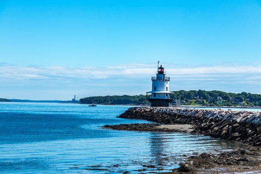 Spring Point Ledge Light is a sparkplug lighthouse in South Portland, Maine that marks a dangerous obstruction on the west side of the main shipping channel into Portland Harbor. It is now adjacent to the campus of Southern Maine Community College.