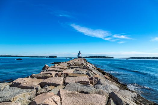 Spring Point Ledge Light is a sparkplug lighthouse in South Portland, Maine that marks a dangerous obstruction on the west side of the main shipping channel into Portland Harbor. It is now adjacent to the campus of Southern Maine Community College.