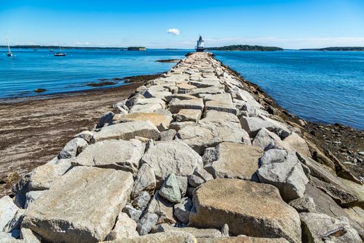 Spring Point Ledge Light is a sparkplug lighthouse in South Portland, Maine that marks a dangerous obstruction on the west side of the main shipping channel into Portland Harbor. It is now adjacent to the campus of Southern Maine Community College.