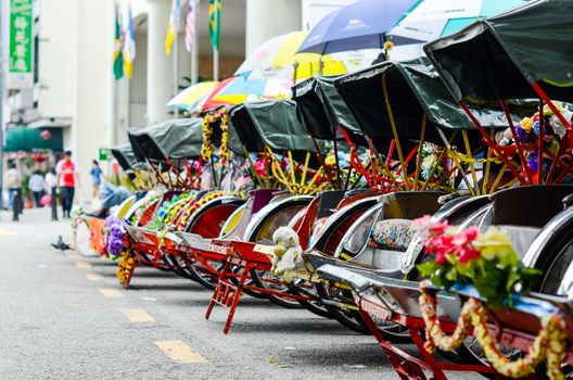 Pahang, Malaysia. Vintage Trishaw stop beside road for service traveller