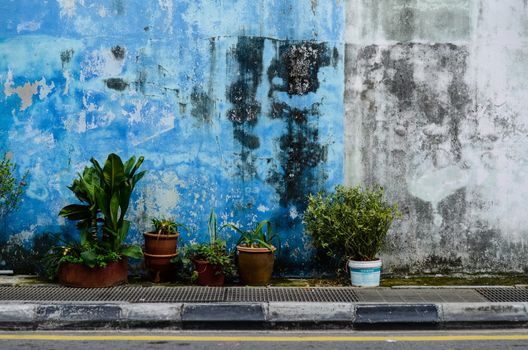 Pahang, Malaysia architecture narrow streets. Dirty moldy humidity cityscape