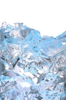 Glass with frozen ice cubes isolated on white