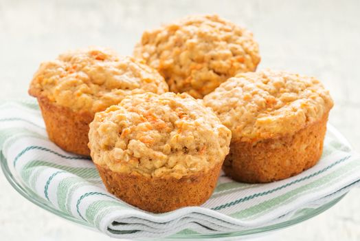 Delicious homemade carrot oatmeal muffins photographed closeup.