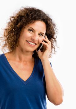 Beautiful young woman with mobile phone making a phone call