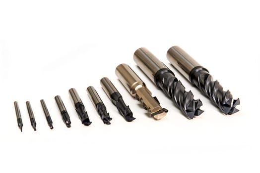 Drill Bits Set Professional Industrial Tools and Equipment on white background