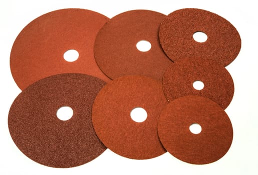 Sandpaper for industrial and home use in different sizes and thickness on white background