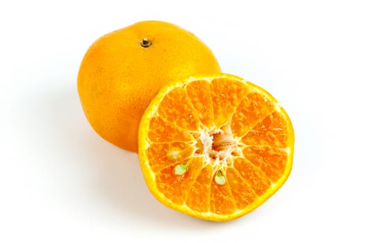 Ripe oranges isolated on white background. Orange in a cut.