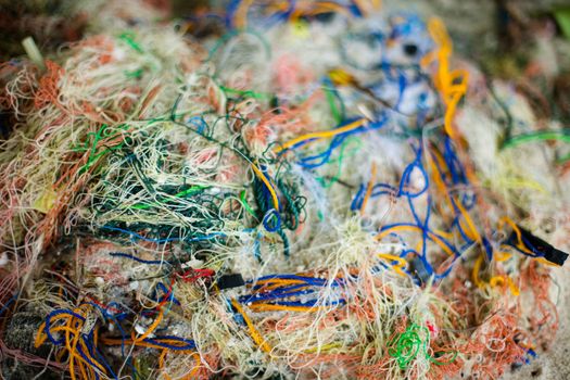 Background of color fishing net and cord rope laces line on the heap